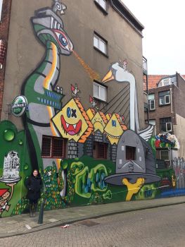 Graffiti in Rotterdam of most popular landmarks with Erasmus Bridge depicted as a swan and cube houses